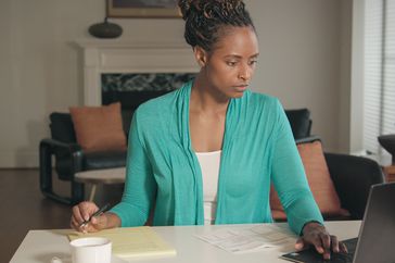 Black Woman Working from Home Office