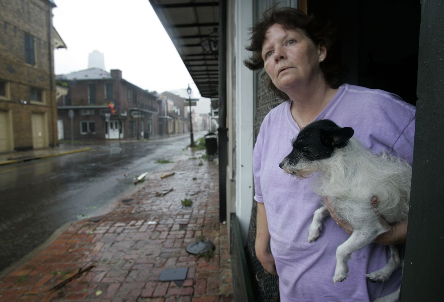 woman with dog after Hurricane Katrina