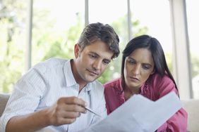 Couple reading how to get rid of an annuity