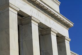 A closeup of the columns of a Federal Reserve building