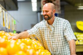 man spending ARRA tax cuts on yellow peppers