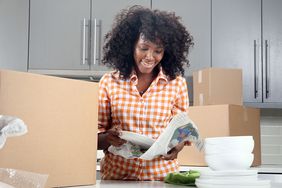 Woman Moving Into a New Apartment