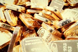 Gold bars loosely piled up