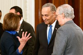 Speaker of the Housr Nancy Pelosi (D-CA), Senate Minority Leader Chuck Schumer (D-NY) and Senate Majority Leader Mitch McConnell (R-KY) attend a reception in the White House January 23, 2017 in Washington, DC.