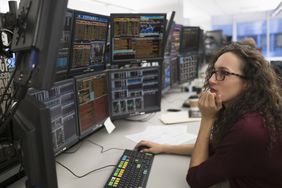 Young woman analyzing commodities trading