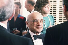 Nobel Prize-winning economist Milton Friedman attends a 1986 Beverly Hills charity dinner in his honor. Duringthe 1980s, Friedman's monetarist policies ruled.