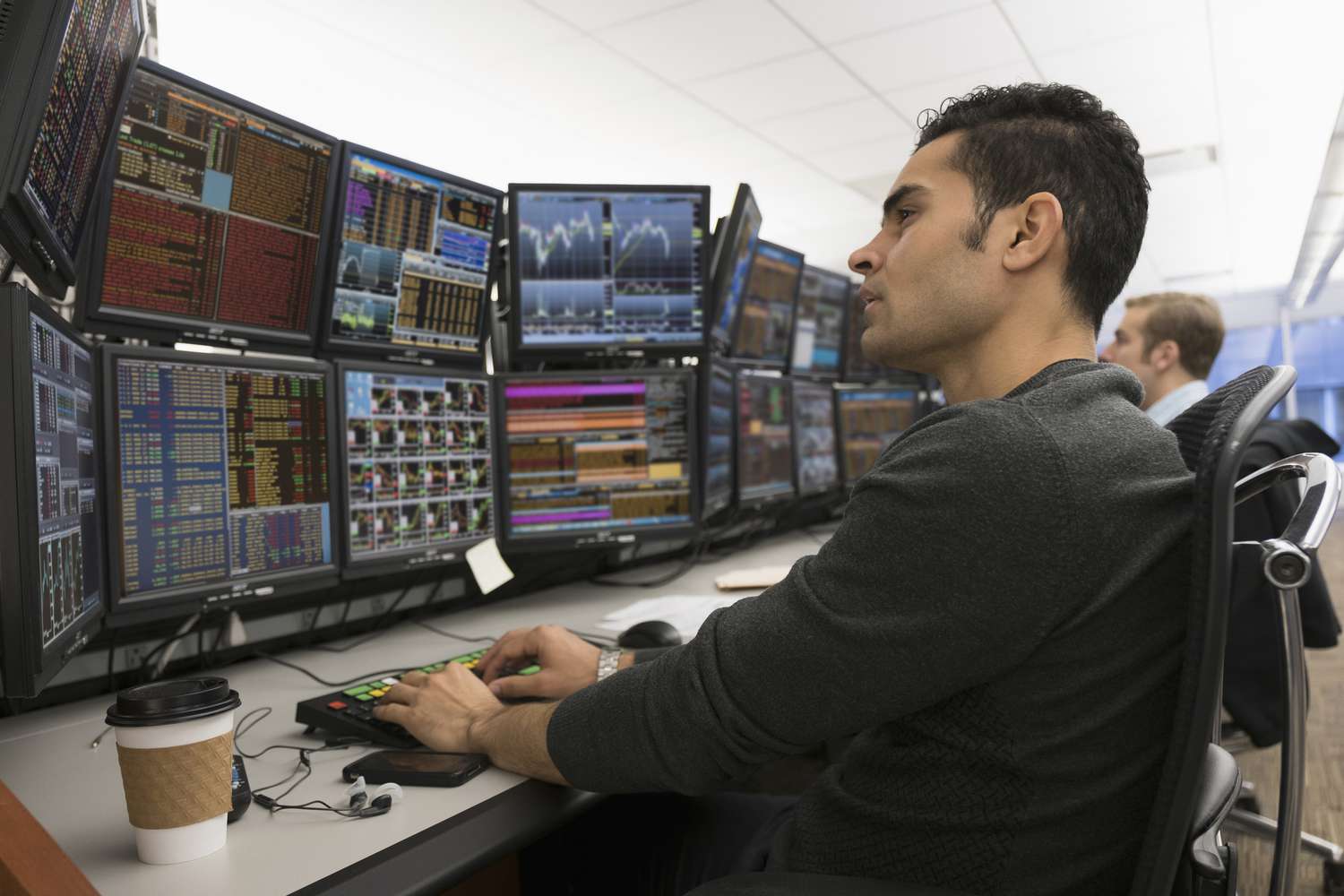 A trader analyzes market data.