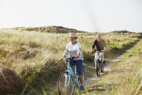 Retired couple riding bicycles